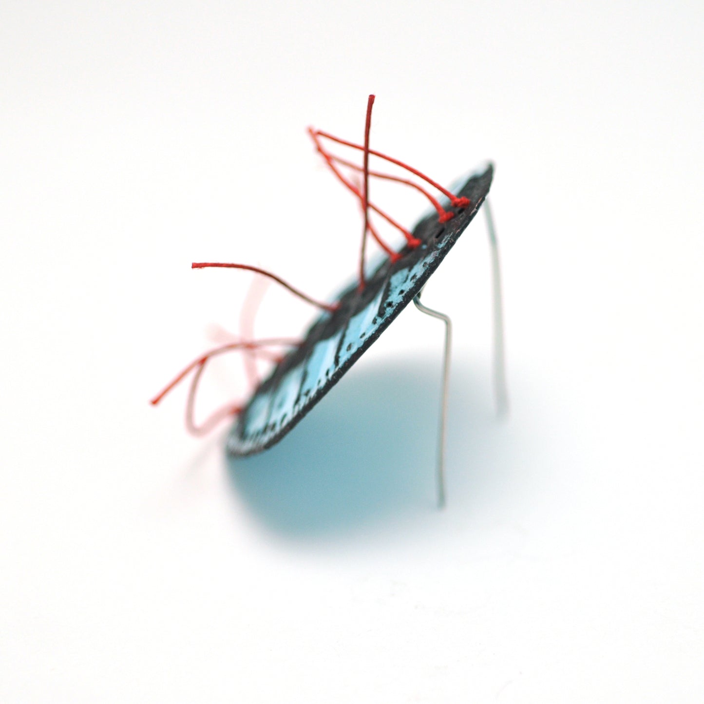 Powder Blue Brooch with red thread