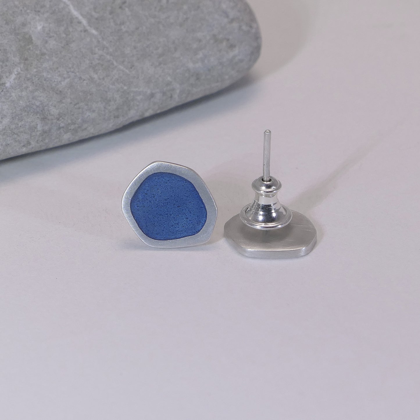 Flat-boulder stud earrings, silver and grey-blue enamel