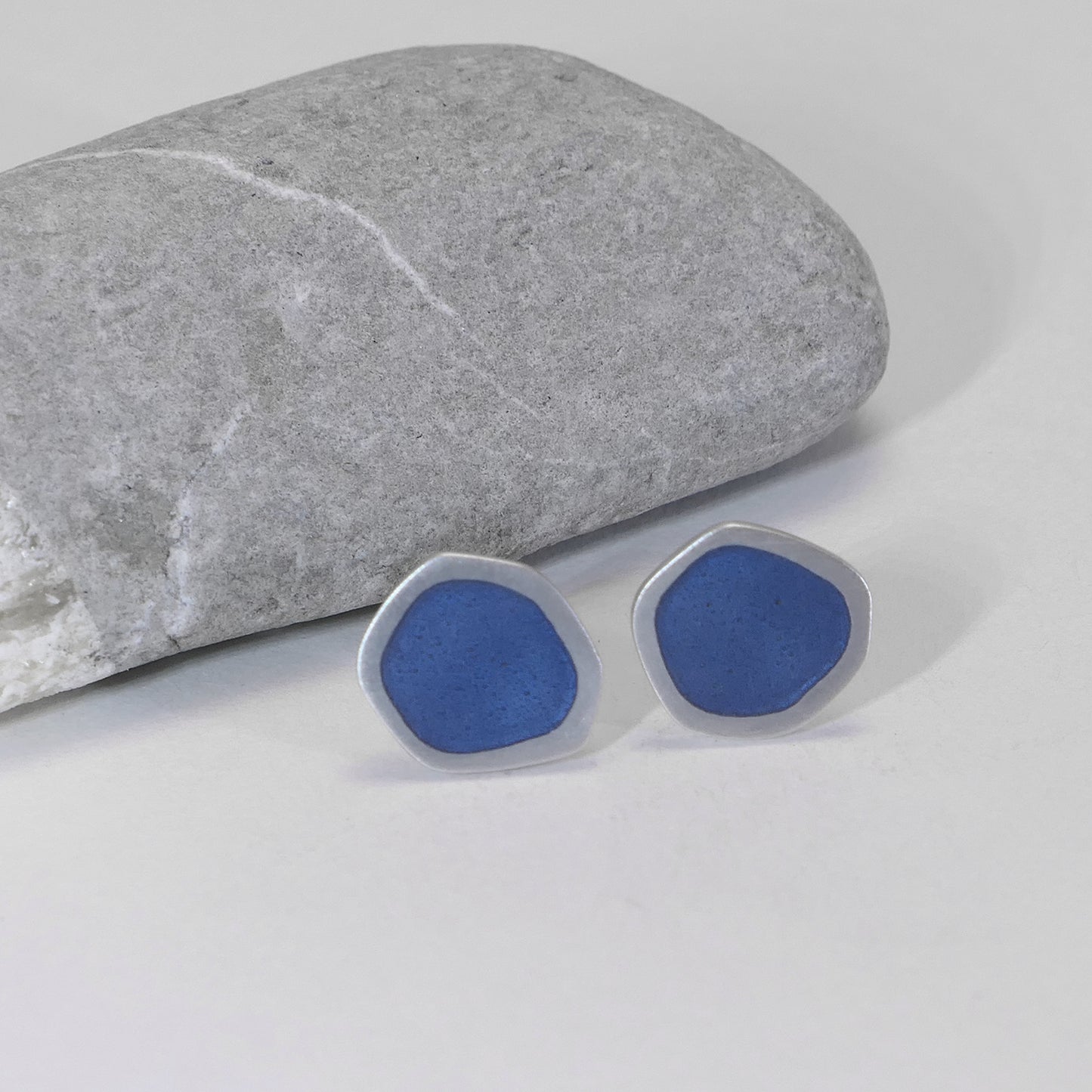 Flat-boulder stud earrings, silver and grey-blue enamel