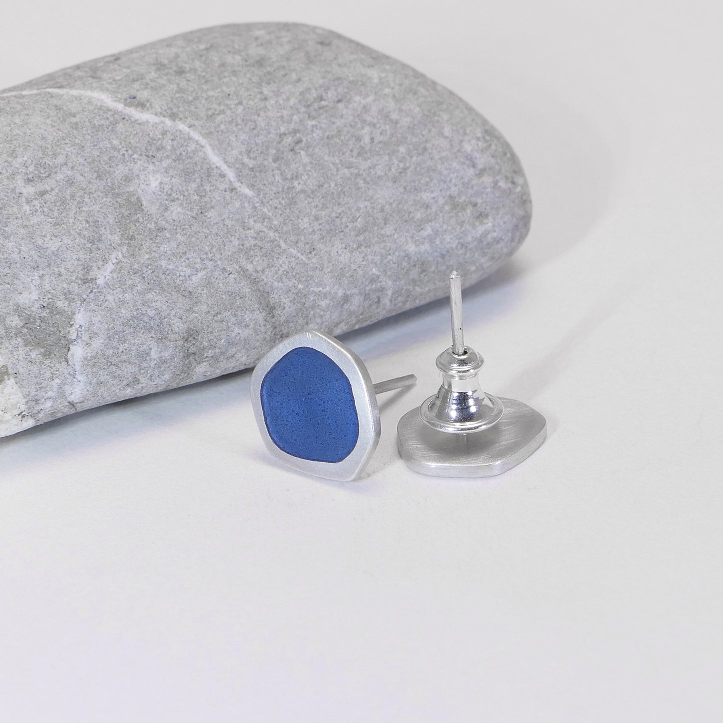 Flat-boulder stud earrings, silver and grey-blue enamel