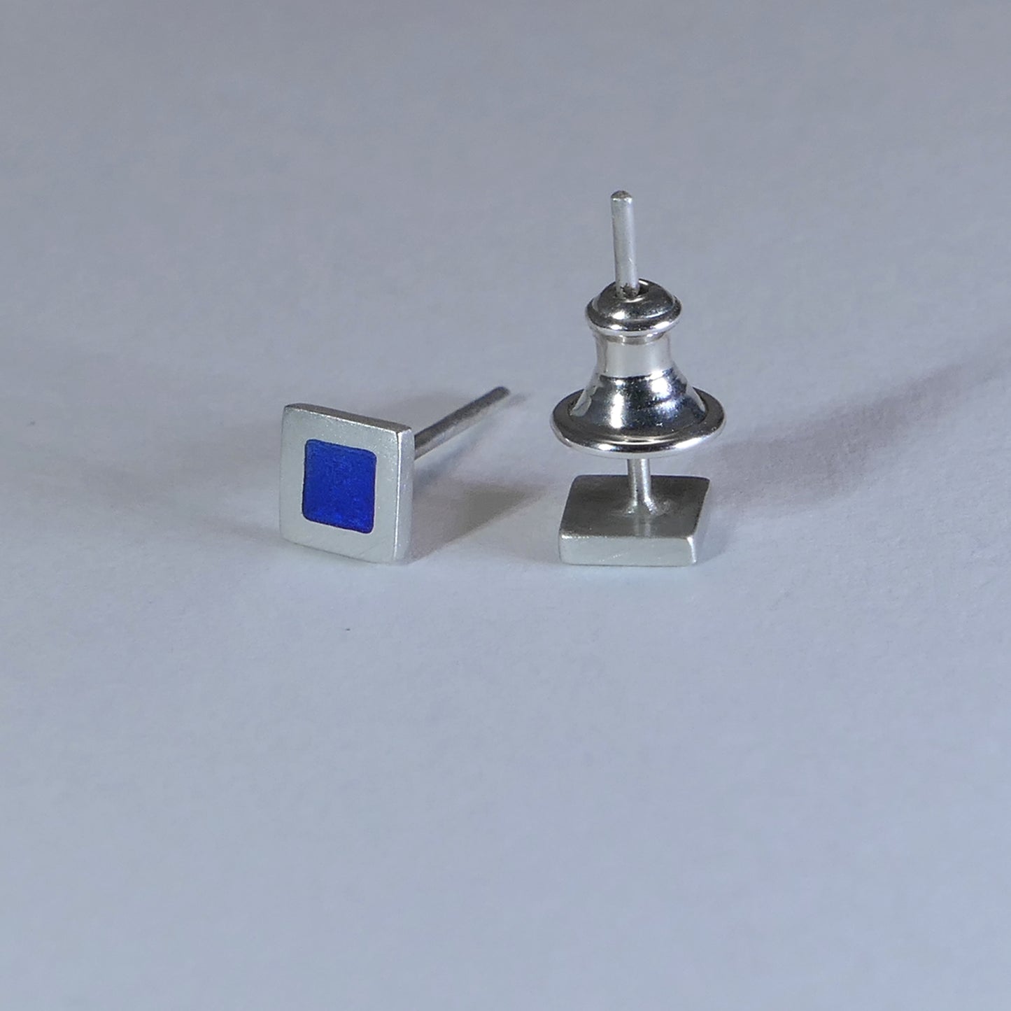 Tiny sterling silver square stud earrings, mid-blue