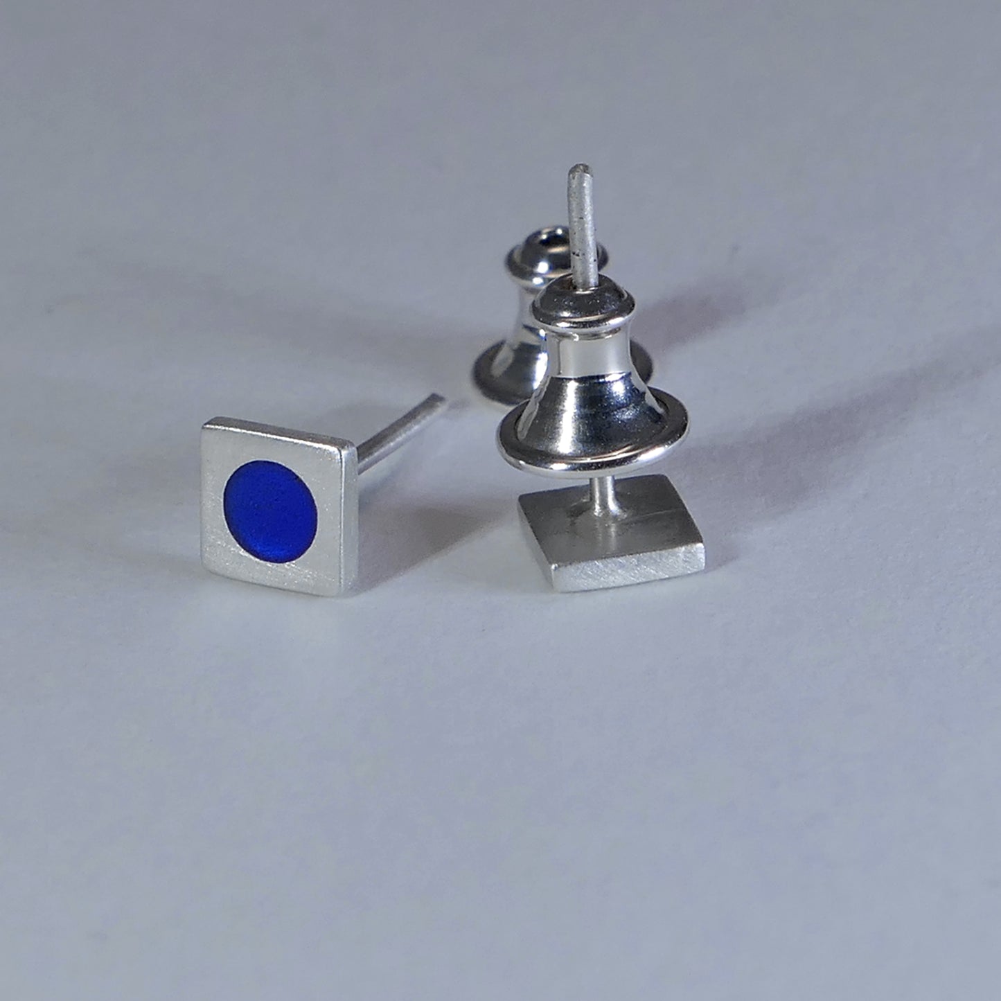 Tiny sterling silver square stud earrings, mid-blue