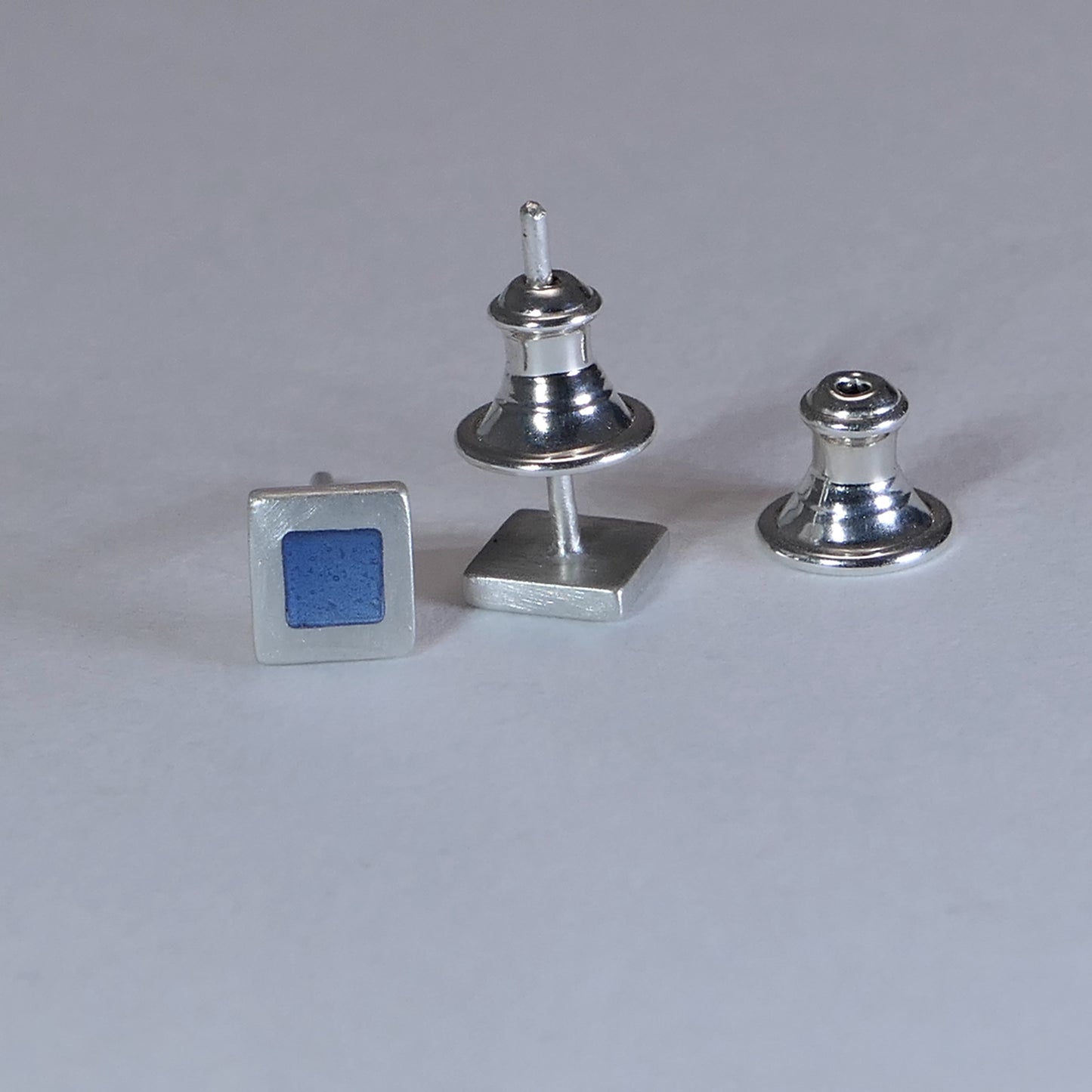 Tiny sterling silver square stud earrings, grey blue